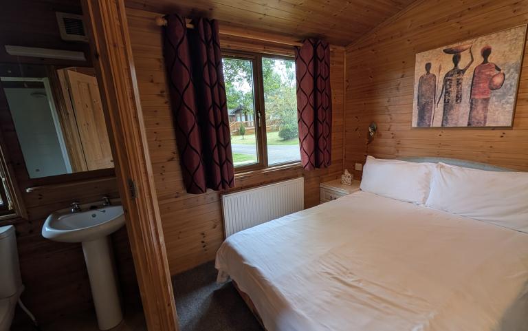 Master bedroom with double bed.