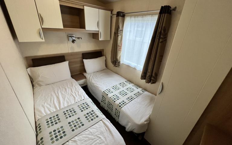 Twin bedroom with two single beds