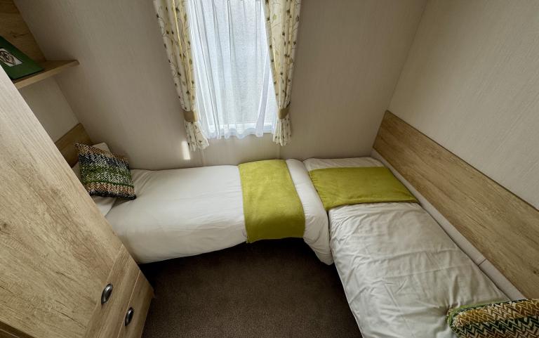 Twin bedroom with two single beds.