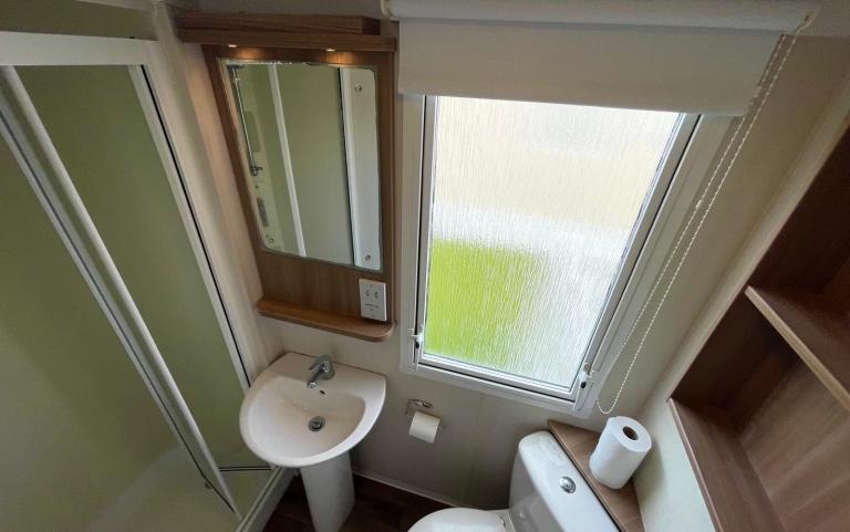 family bahtroom in the 2016 Swift Loire 28x12