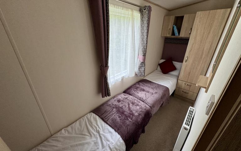 Twin bedroom with two single beds.