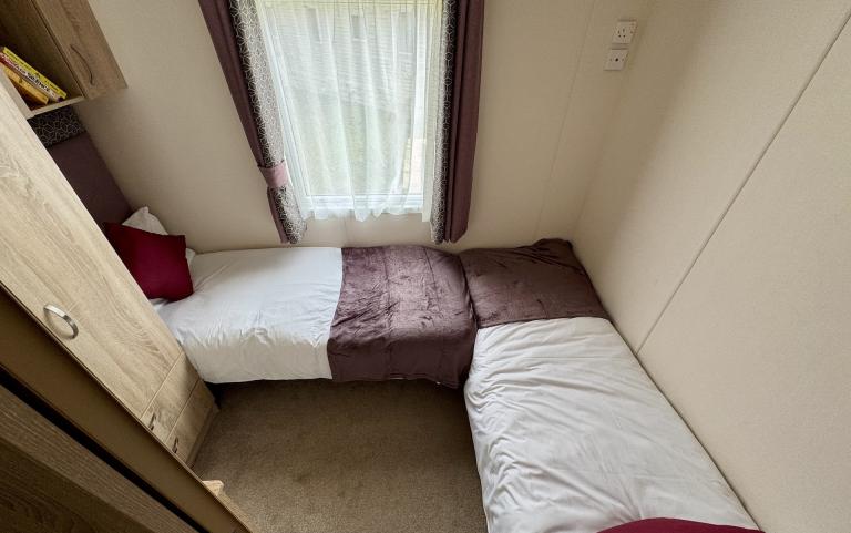 Twin bedroom with two single beds.