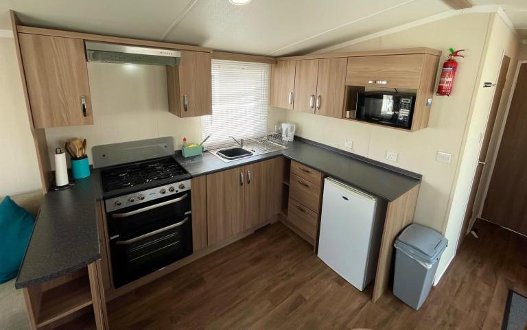 kitchen in the 2016 Swift Loire 28x12
