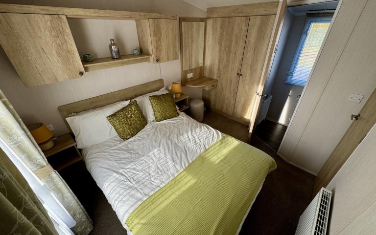 Master bedroom with double bed.