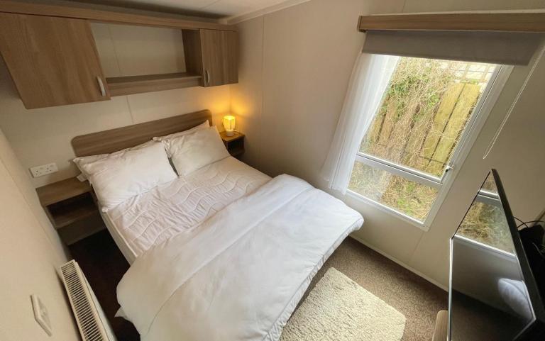 master double bedroom in the 2016 Swift Loire 28x12