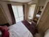 Interior of Master bedroom with double bed.