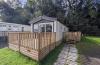 Exterior of caravan with wooden decking