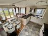 Interior view of the open plan kitchen and dining area.
