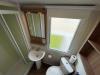 family bahtroom in the 2016 Swift Loire 28x12