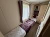Twin bedroom with two single beds.