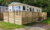 Exterior of caravan with wooden decking