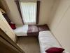 Twin bedroom with two single beds.