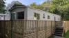 Exterior of a static caravan in the sun