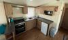 kitchen in the 2016 Swift Loire 28x12