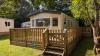 Exterior of a static caravan in the sun