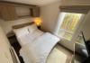 master double bedroom in the 2016 Swift Loire 28x12